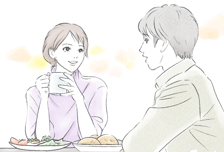 食卓で会話する男女